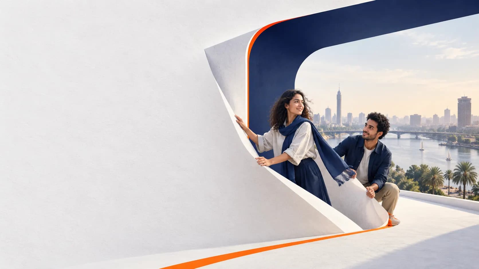Two young people unfold a large white paper gateway overlooking the Nile and the Cairo skyline.